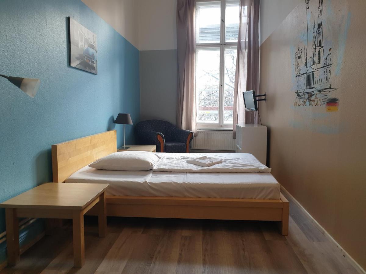 Eenpersoonskamer met Gedeelde Badkamer en Toilet